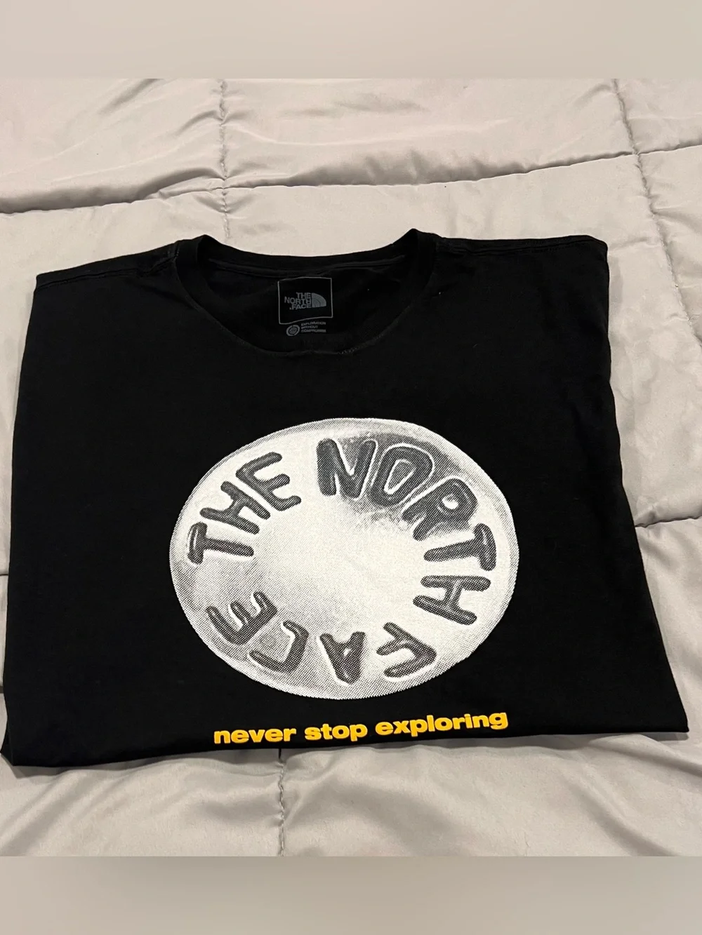 The North Face Men's Black Tee with White Circle Logo and Yellow Text XXL